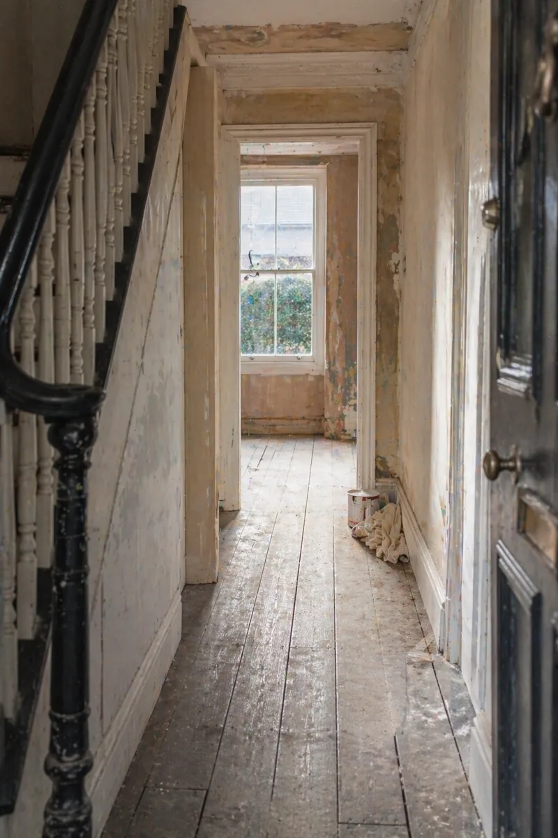 Victorian terraced house hallway during renovation.